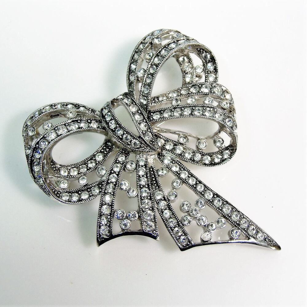 Joan Rivers Gift Bow Brooch Pin 2.5" Silver Rhinestone Studded Open Metalwork